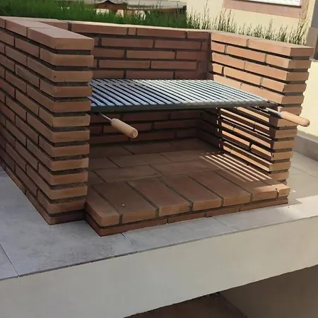 Holiday home Adosado Con Piscina A 10 Minutos De